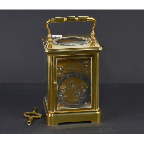 256 - A French Brass Four Plate Carriage Clock with visible escapement, Roman Numerals & Striking Complete... 