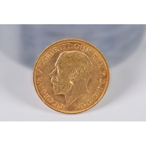 222A - A 1911 George V Gold Sovereign. Marked B.P.