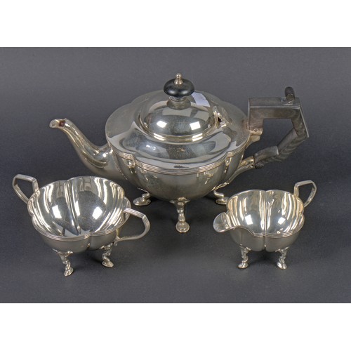 14 - A Three Piece Early Morning Tea Set of Georgian form, ebony handles & reeded decoration. Weighing: 4... 