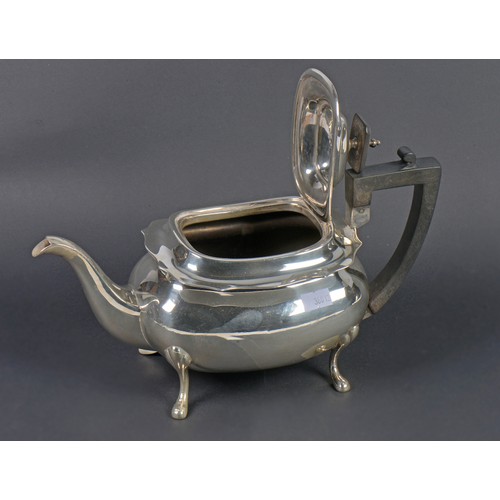 15 - A Three Piece Georgian design Silver Tea Set with a Chippendale Border & resting on Pad Feet. Sheffi... 