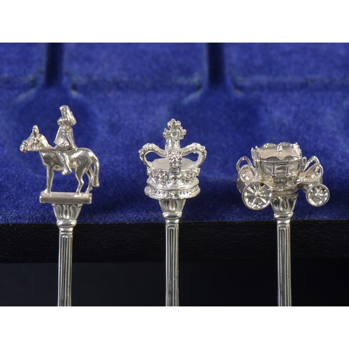 16 - A Set of 6 Silver Seal Topped Spoons decorated with a Coach, Brighton Pavilion, Orb, Throne & Rider ... 