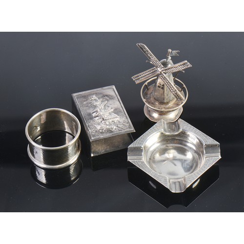 29 - A Silver Napkin Ring. Marked A. Silver Ashtray, Match Holder & a Dutch Windmill.