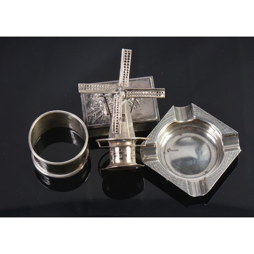 29 - A Silver Napkin Ring. Marked A. Silver Ashtray, Match Holder & a Dutch Windmill.