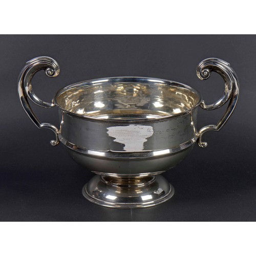 33 - A Silver Double Handled Trophy Cup with Scroll Handles. Birmingham U. Weighing: 457 Grams.