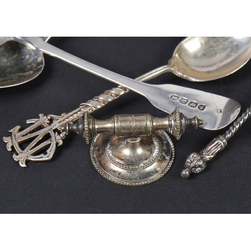 46 - A Collection of Silver Tea Spoons to include Apostle, Mustard, Commemorative, etc. Weighing: 101 gra... 