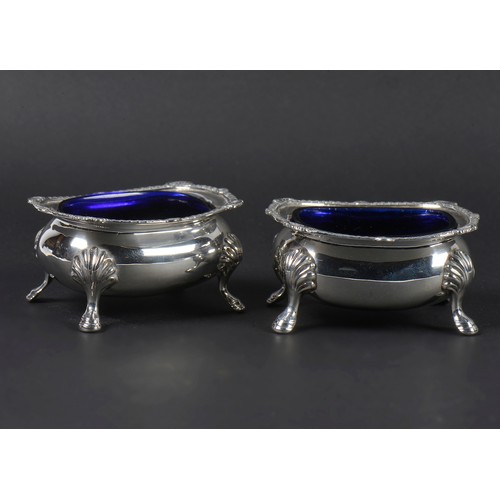 59 - A Pair of Georgian design Silver Salt Cellars resting on pad feet. London A. Weighing: 126 grams.