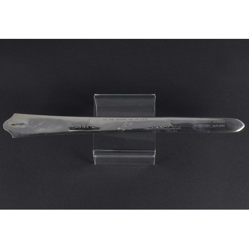 76 - A Silver Asprey's Paper Knife with a Cut out Silhouettes of Ships to the Skipper & his Mate, Happy M... 