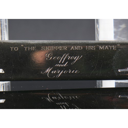 76 - A Silver Asprey's Paper Knife with a Cut out Silhouettes of Ships to the Skipper & his Mate, Happy M... 