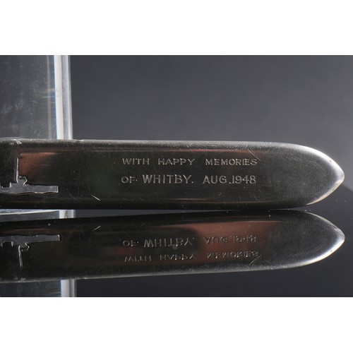 76 - A Silver Asprey's Paper Knife with a Cut out Silhouettes of Ships to the Skipper & his Mate, Happy M... 