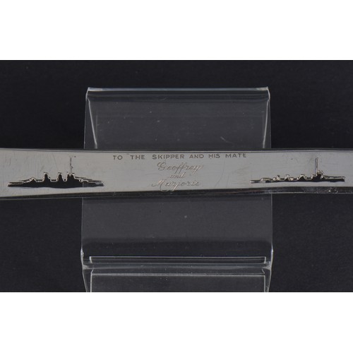 76 - A Silver Asprey's Paper Knife with a Cut out Silhouettes of Ships to the Skipper & his Mate, Happy M... 