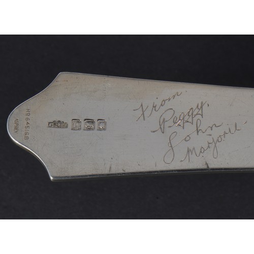 76 - A Silver Asprey's Paper Knife with a Cut out Silhouettes of Ships to the Skipper & his Mate, Happy M... 