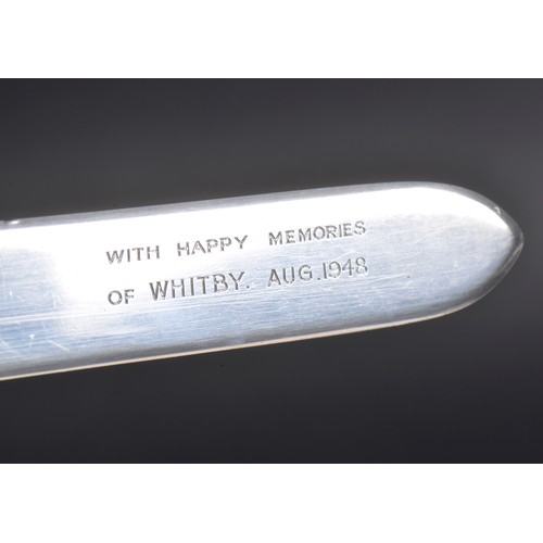 76 - A Silver Asprey's Paper Knife with a Cut out Silhouettes of Ships to the Skipper & his Mate, Happy M... 