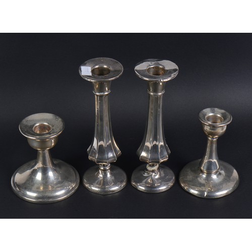 80 - A Pair Sheet Silver Candlesticks & two other Candlesticks. (AF).