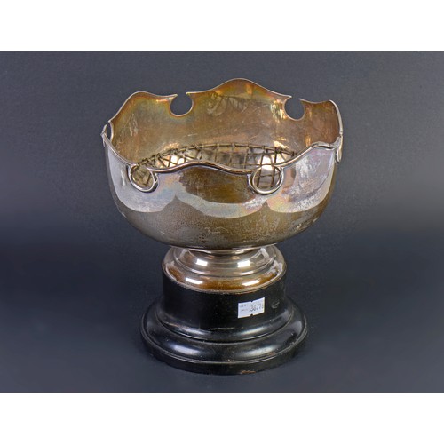 86 - A Silver Rose Bowl with a Crenulated Top standing on a Stand. London S. Weighing: 368 grams.