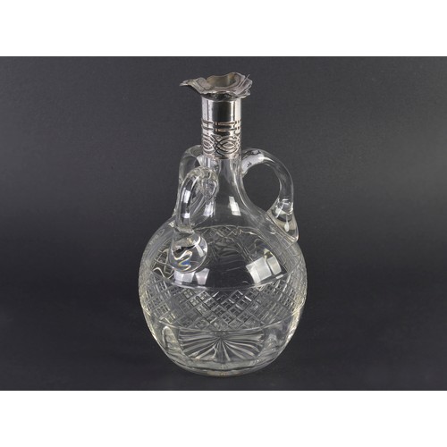 88 - A Silver mounted pierced Cut Glass Liquor Decanter. London Hallmark.