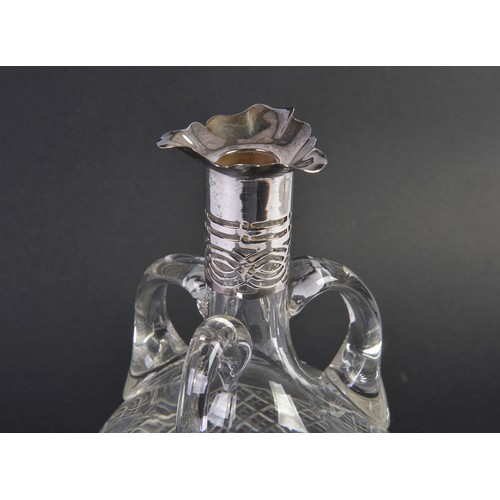 88 - A Silver mounted pierced Cut Glass Liquor Decanter. London Hallmark.