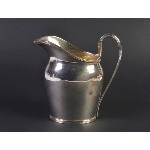 90 - A Georgian designed Cream Jug with a reeded handle. Weighing: 138 grams.