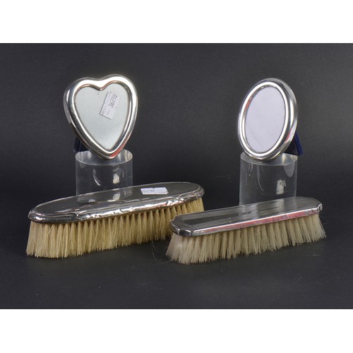 93 - Two Silver Picture Frames & Two Silver Hairbrushes.