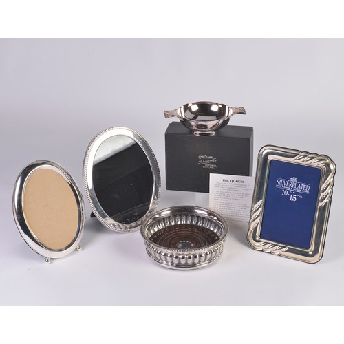 95 - A Silver Plated Wine Coaster, a Quaich in Box & three Silver Plated Frames.