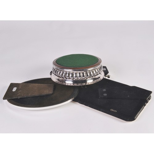 95 - A Silver Plated Wine Coaster, a Quaich in Box & three Silver Plated Frames.