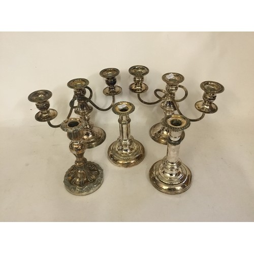 113 - A Pair of Silver Plated Telescopic Candlesticks & a Pair of Silver Plated Candelabra.