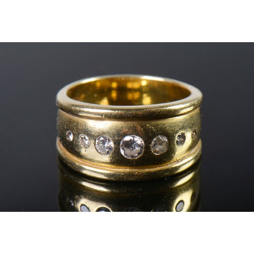 147 - An 18ct Gold & ribbed edged Diamond Ring inset with seven Diamonds. Weighing: 9.1 grams. Size: M.