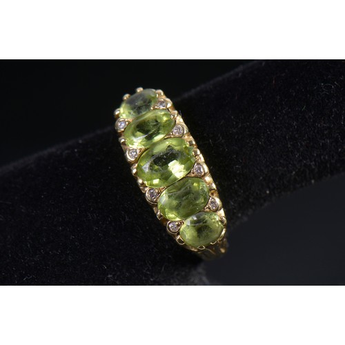 148 - A Ladies 18ct Gold Victorian design Peridot & Diamond Dress Ring. Weighing: 5.3 grams. Size: M.