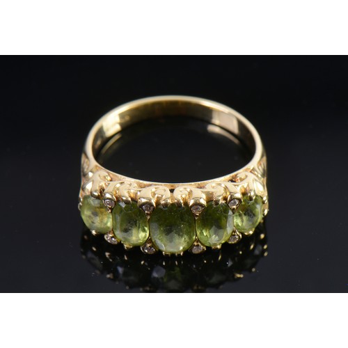 148 - A Ladies 18ct Gold Victorian design Peridot & Diamond Dress Ring. Weighing: 5.3 grams. Size: M.