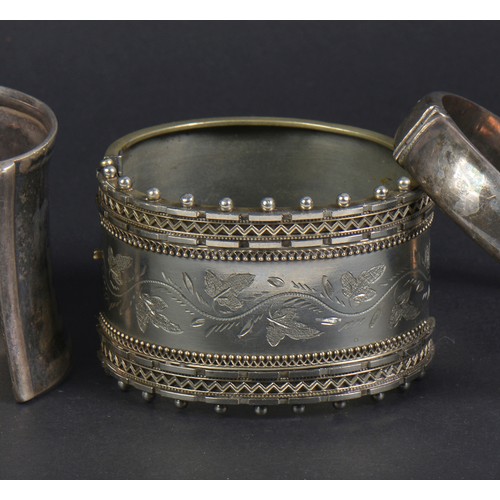 157 - A Victorian Silver design Bangle, one other with engraved decoration & a Cuff.