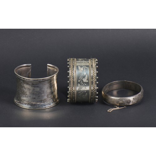 157 - A Victorian Silver design Bangle, one other with engraved decoration & a Cuff.