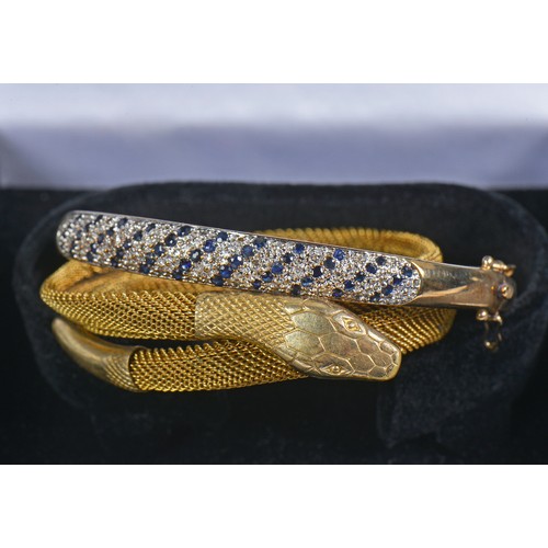 161 - A 9ct Gold & Diamond Line set Bangle. Weighing: 11 Grams. Along with a Victorian Metal Snake Bangle.