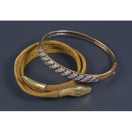 161 - A 9ct Gold & Diamond Line set Bangle. Weighing: 11 Grams. Along with a Victorian Metal Snake Bangle.