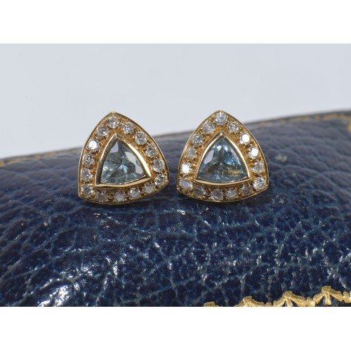 207 - A Pair of 18ct Gold Aquamarine & Diamond Earrings. Weighing: 2.9 grams.