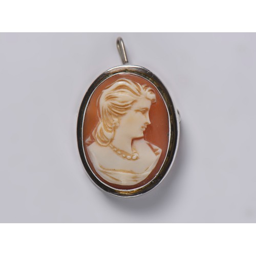 213 - A Cameo Brooch of a Young Girl in an 800 setting.