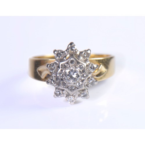 228 - A Ladies 18ct Gold Diamond Cluster Ring set with numerous Diamonds in an Open Work Setting. Size: K.... 