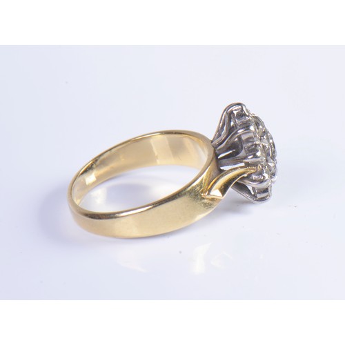 228 - A Ladies 18ct Gold Diamond Cluster Ring set with numerous Diamonds in an Open Work Setting. Size: K.... 