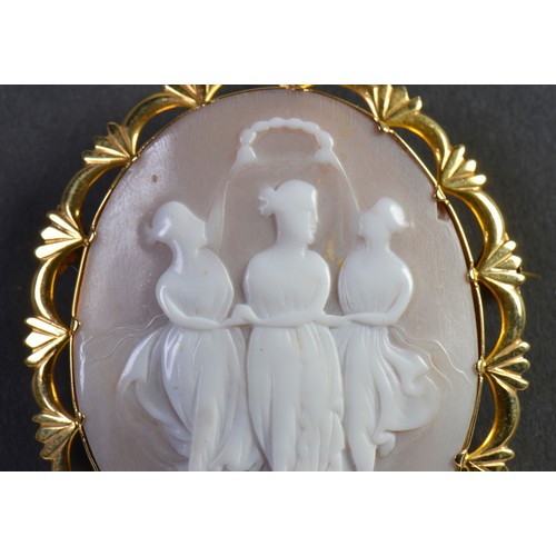 229 - A 9ct Gold Cameo Brooch of the Three Graces. Measuring: 7cms x 5.5cms.