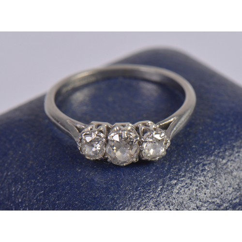 245 - A Ladies Three Stone Platinum Set Dress Ring. Size: N/O. Weighing: 3.4 grams.