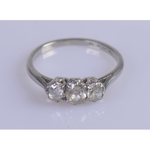 245 - A Ladies Three Stone Platinum Set Dress Ring. Size: N/O. Weighing: 3.4 grams.