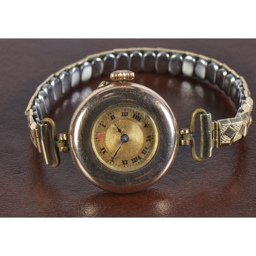 305 - A Gold Ladies Wristwatch on an Expandable Bracelet.