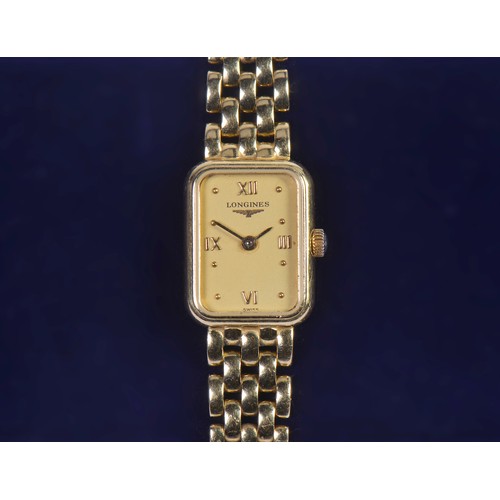 309 - A Ladies 18ct Gold Longines Wristwatch on a flexible Bar Link with a square face. Weighing: 30.8 gra... 