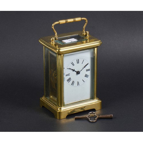 325 - A French Brass cased Four Plate Carriage Clock enamelled face & Key.