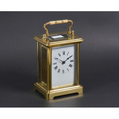 326 - A French Brass cased Four Plate Carriage Clock enamelled face.