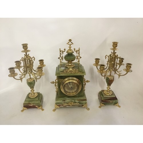 330 - A 20th Century Mantle Clock along with Two Matching Candelabra's.