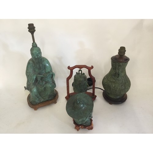 349 - A Group of Four Chinese Bronze items from the 1970s to include two lamps, a Gong & a Chinese Figure.