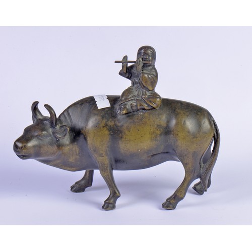 361 - A Chinese Bronze study of a Flute Player on an Oxon, a Carved Wood Study of a Temple Dog & two paint... 