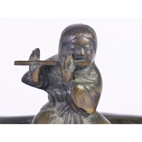 361 - A Chinese Bronze study of a Flute Player on an Oxon, a Carved Wood Study of a Temple Dog & two paint... 