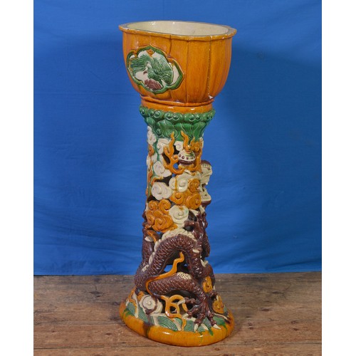 365 - A Chinese Dragon decorated Pottery Pedestal Jardiniere in Brown, Cream & Green Glaze. Measuring: 94c... 