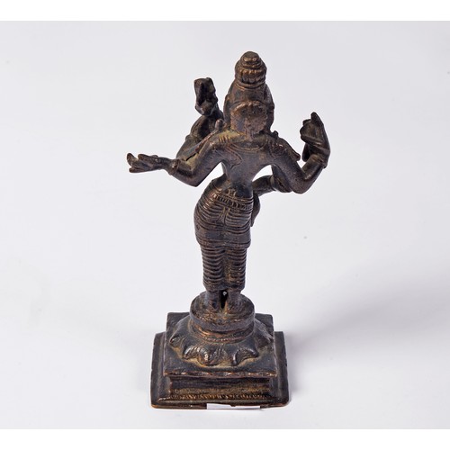 369 - An Antique Indian Shiva depicting the four armed Goddess holding a Lute, a Snake & a Butter ball, po... 