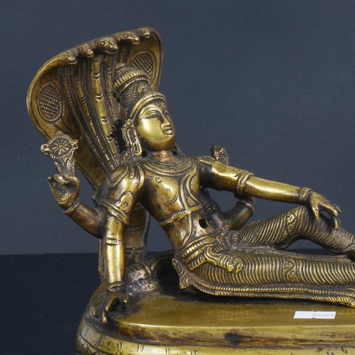 372 - An Indian Cast Brass study of a reclining 